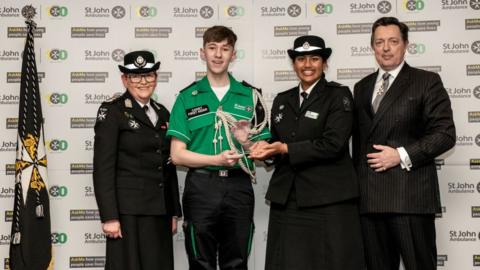 L-R – St John Ambulance Chief Commissioner, Ann Cable; Regional Cadet of the Year 2023 for the West Midlands, McKenzie Foulkes; Regional Cadet of the Year 2022 for the West, Sravya Pachala; Prior of the Priory of England and the Islands of the Order of St John, Stuart Shilson.