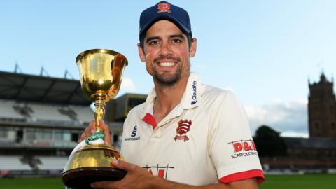 Essex opener Alastair Cook with the County Championship trophy