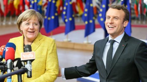 Angela Merkel and Emmanuel Macron