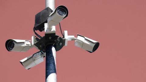 A stock illustration of surveillance cameras