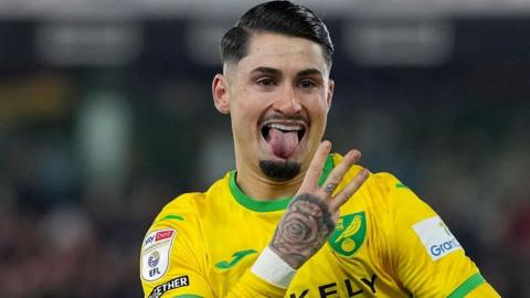 Norwich City forward Borja Sainz holds up three fingers