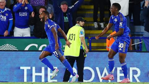 Richard Pereira celebrates in front of the Leicester fans