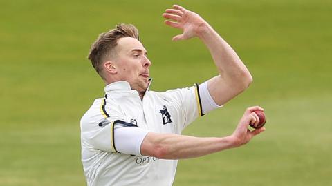 Craig Miles in bowling action for Warwickshire