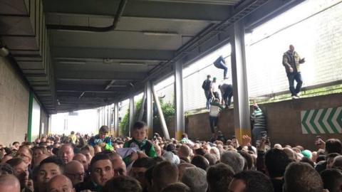 Celtic fans trying to escape the crush