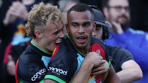 Harlequins' Louis Lynagh (L) and Will Joseph