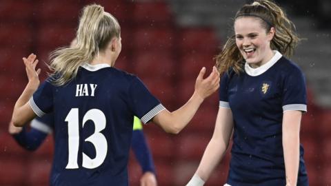 Scotland's Brogan Hay and Emma Watson celebrate