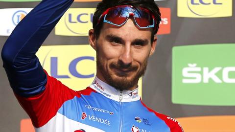 Niccolo Bonifazio smiles on the podium after winning stage five of Paris-Nice