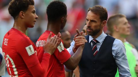 Gareth Southgate with England players Dele Alli and Marcus Rashford