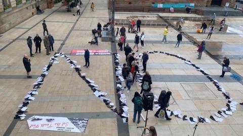 Protesters at Guildhall Square in Derry