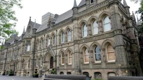 A two-storey sandstone building, the home of Middlesbrough Council, dating from the 1880s. It has a pitched slate roof, turrets, high arched windows and engravings between storeys.