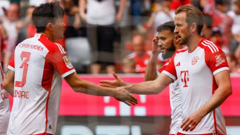 Bayern Munich's Harry Kane celebrates scoring against Eintracht Frankfurt in Bundesliga