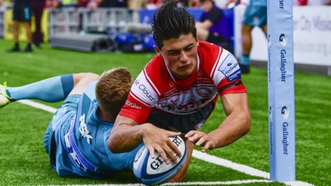 Louis Rees-Zammit scores a try for Gloucester