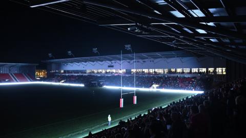 Leigh Sports Village is pitched into darkness after floodlight failure at the venue during Leigh v Huddersfield