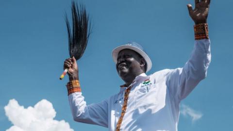 Kenya's opposition National Super Alliance (NASA) coalition leader Raila Odinga reacts to supporters during a political rally at Jacaranda grounds in Nairobi on September 17, 2017