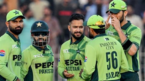 Pakistan's players celebrate taking a wicket against South Africa during a one-day international in November 2025