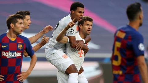 Thomas Muller (centre) celebrates scoring for Bayern Munich against Barcelona