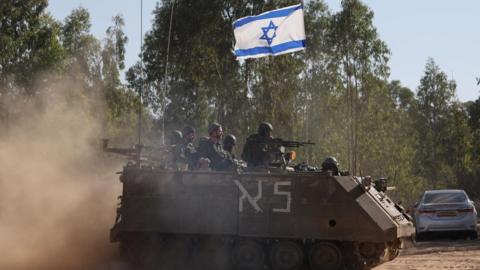 Israeli soldiers patrol along the border with southern Gaza, in Israel, 26 October 2023