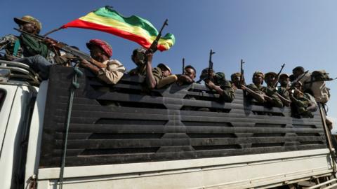 Troops ride in trucks to face soldiers loyal to the Tigray People's Liberation Front