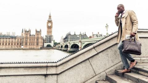 Man waking past Westminster