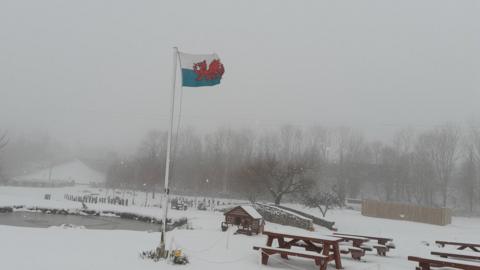 Holywell snow and Welsh flag