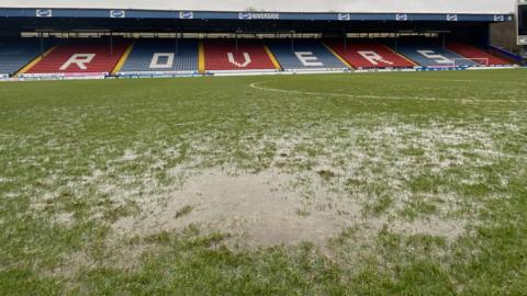 The waterlogged pitch at Ewood Park