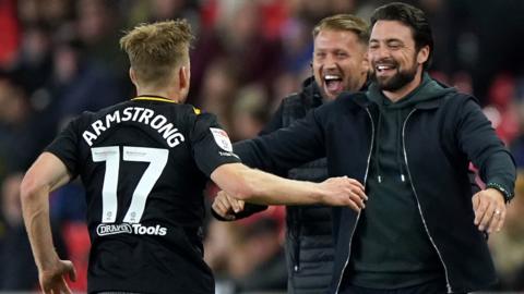 Stuart Armstrong celebrates scoring Southampton's opener at Stoke with manager Russell Martin