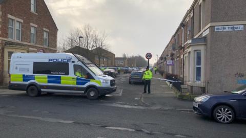 Police cars and cordon in the West End