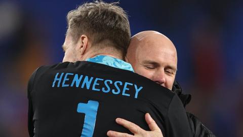 Wayne Hennessey and Robert Page embrace