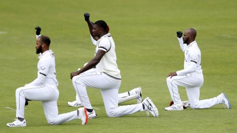 West Indies players take a knee