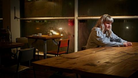 A woman at a table