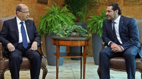 A handout picture shows Lebanese President Michel Aoun (L) and Prime Minister Saad Hariri (R) meeting at the presidential palace in Baadba, outside Beirut (22 November 2017)