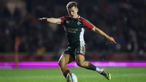 Billy Searle of Leicester Tigers kicks a conversion