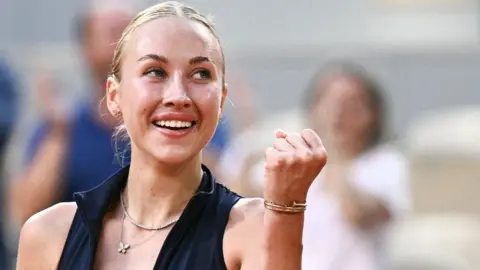 Anastasia Potapova celebrates