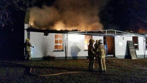 Fire fighters tackle a fire at Strangford Sailing Club in County Down