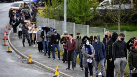 People queuing for a jab in Bolton