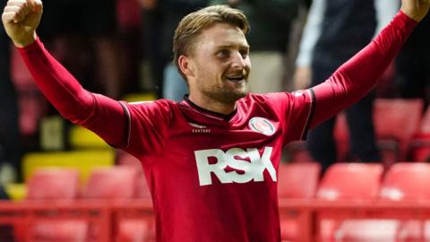 Alfie May celebrates scoring for Charlton against Exeter