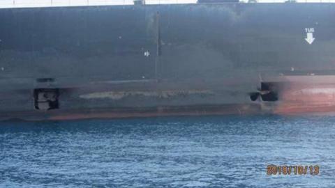 Photo of two holes in an Iranian tanker