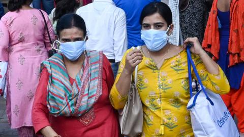 Shoppers in Delhi on 19 June 2021