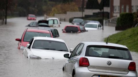 Cars submerged in flood water in Hartcliffe in Bristol in 2016
