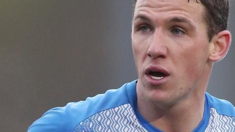 John Rooney in action for Barrow