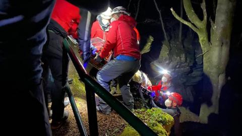 teenager being rescued