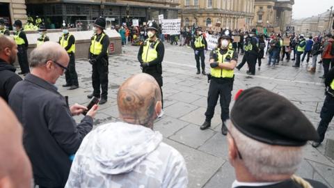 Opposing protest groups at Newcastle's Grey's Monument