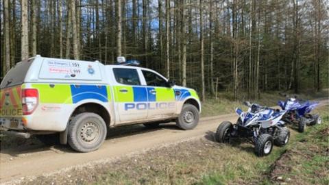 Police truck and off-road bikes