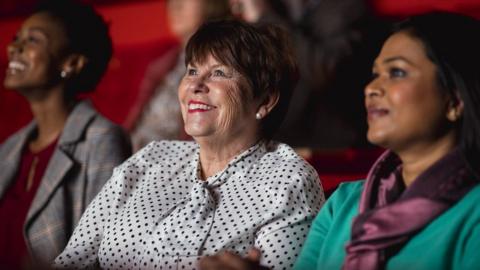Three women in the cinema
