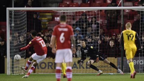 Mikael Mandron scores his first penalty against Lincoln