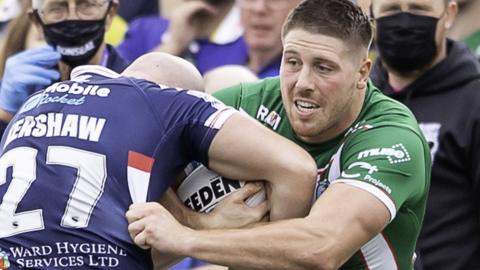 Tom Lineham (right) in action for Warrington