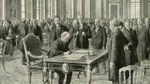 The Prime Minister of Great Britain Signing the Peace Treaty", 1919