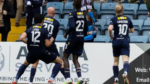 Dundee players celebrate