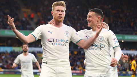 Kevin de Bruyne (left) celebrates scoring