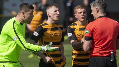 Neil Parry protests his red card